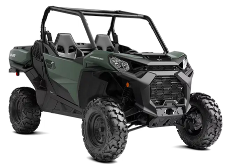 Dark green and black Can Am Commander UTV with large knobby tires in collection