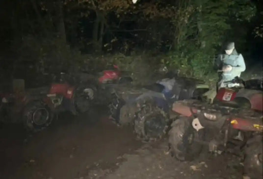 Mud-covered ATVs.