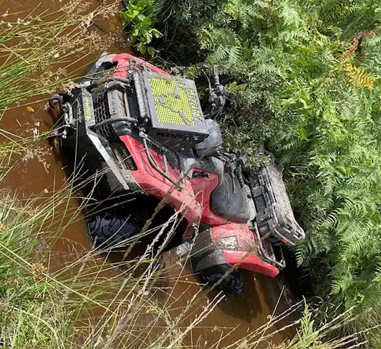 Red all-terrain vehicle.
