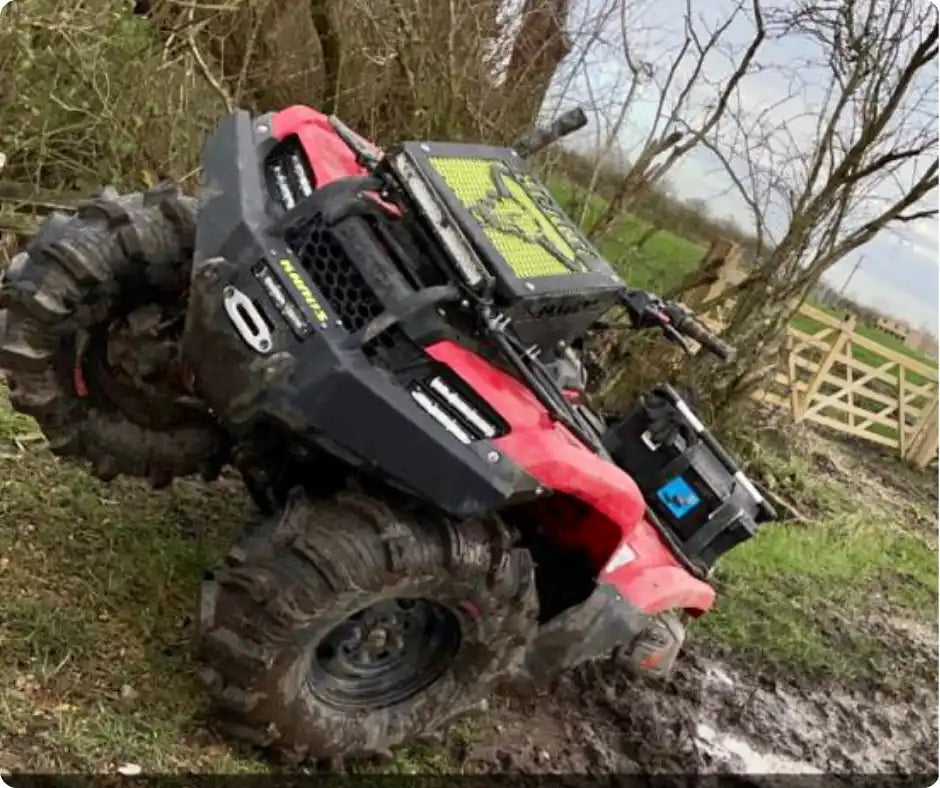 Red and black all-terrain vehicle.