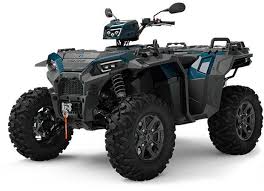Dark teal and black Polaris Sportsman 4x4 all-terrain vehicle with four large tires