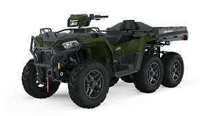 Dark green Polaris Sportsman 6x6 800 all-terrain vehicle with cargo bed
