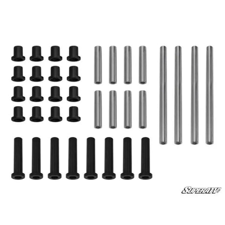 Collection of metal pins and black bushings for vehicle suspension system in SuperAtv A-Arm Bush Kits