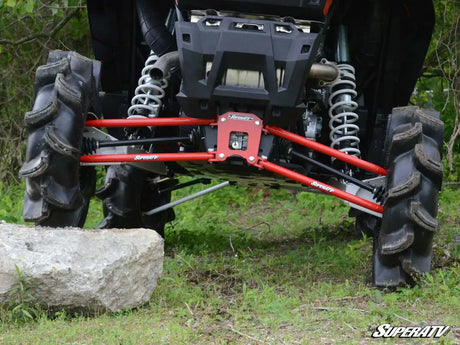 Undercarriage of SuperAtv Radius Arms all-terrain vehicle with heavy-duty suspension and large knobby tires